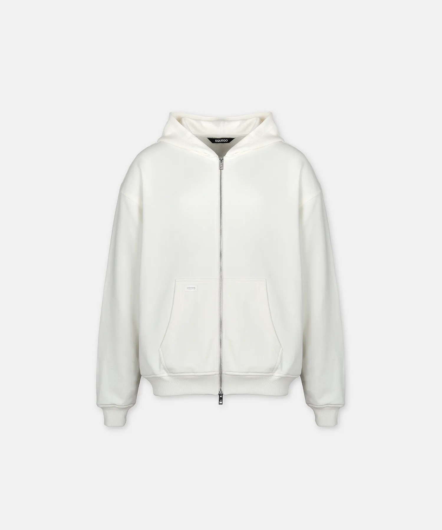 Squeqo Essential Oversized Zip Hoodie in Off-White, freigestellt auf hellem Hintergrund.