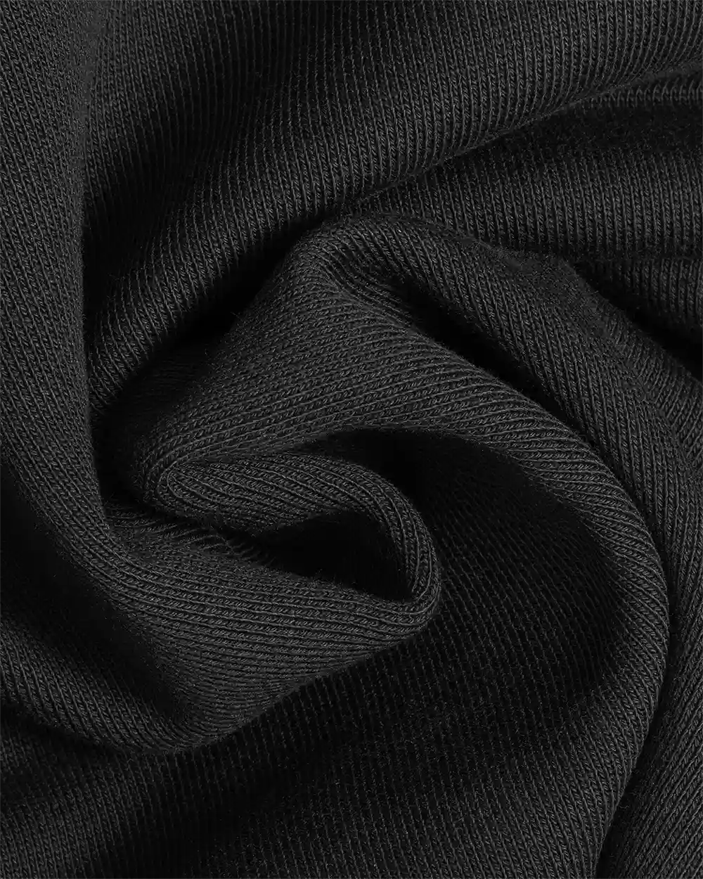 Makro-Aufnahme der Außenseite des schweren 590 GSM Baumwollstoffs des SQUEQO Hoodies, die die dichte, glatte und hochwertige Webart zeigt.