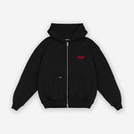 Schwarzer Oversize Zip Hoodie mit rotem Print "Studio Berlin SQUEQO", Vorderansicht.