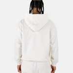 Rückansicht eines männlichen Models im Squeqo Essential Oversized Zip Hoodie in Off-White.