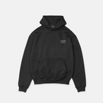  SQUEQO Heavyweight Hoodie Dunkelgrau. Vorderseite mit Humanity V.2.0 Brustlogo. Clean Design ohne Kordeln.