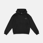 SQUEQO Hoodie Damen Schwarz verkürzt. Vorderseite mit Humanity V.2.0 Brustlogo. Fit 02 Schnitt für Frauen.